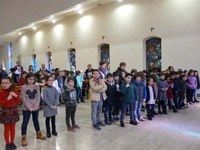 The children make the Way of the Cross