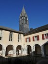 Chiostro e campanile della casa San Michele a Pau